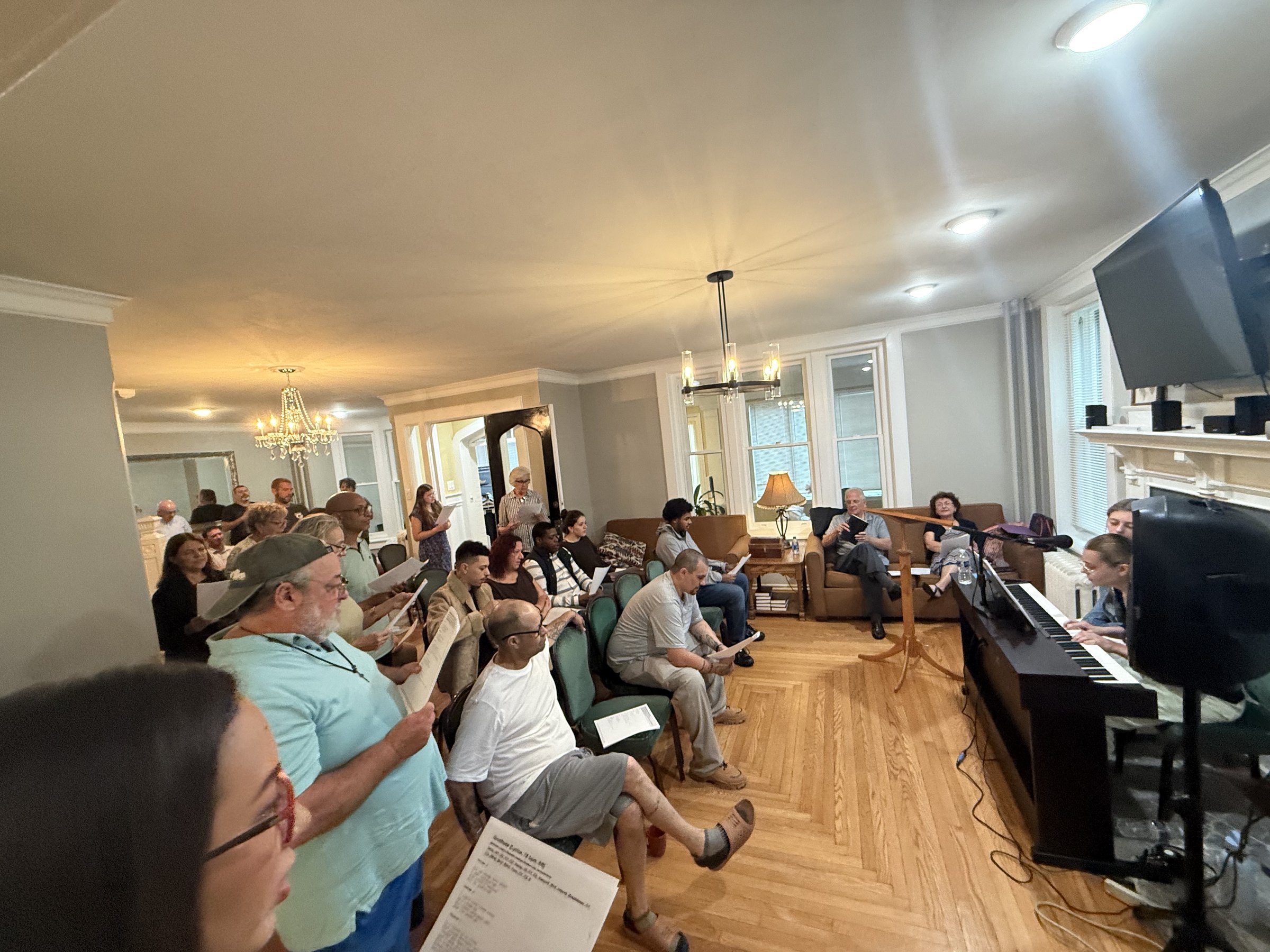 Worship at the piano in a house church